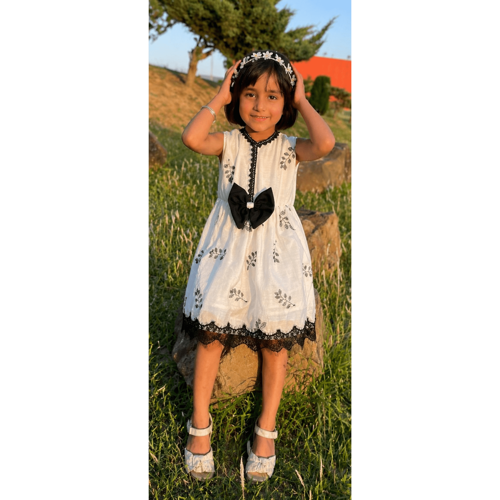 Girls' Elegant White Cotton Silk Frock with Black Floral Embroidery & Lace Trim – RAB 180